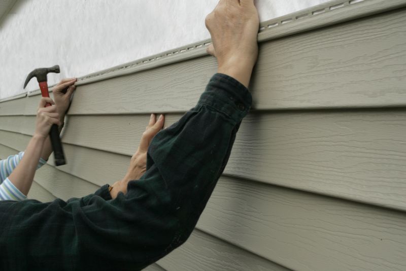 Professional Installing Vinyl Siding